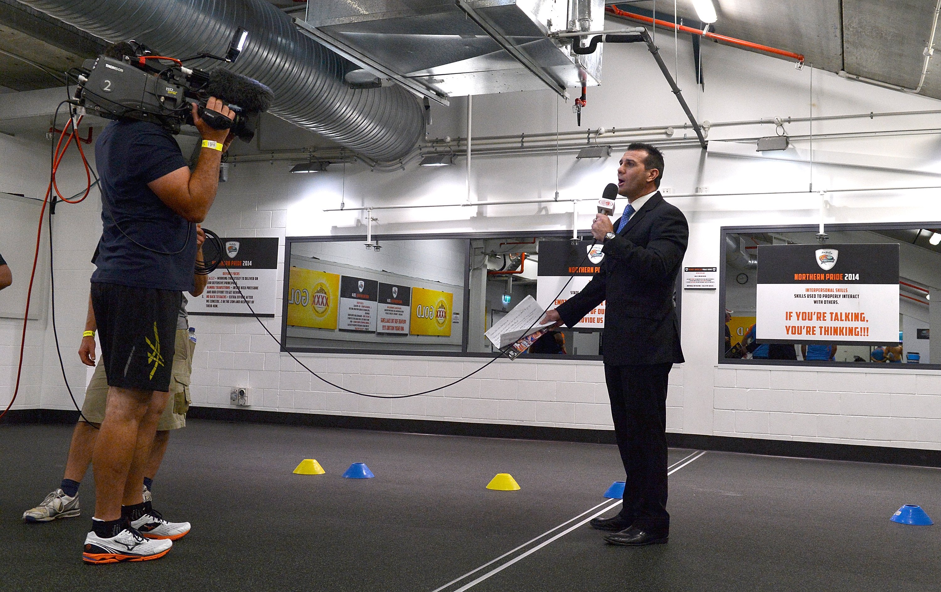 Sattler shoots a piece to camera ahead of the Super Cup grand final in 2014. PHOTO: GETTY IMAGES