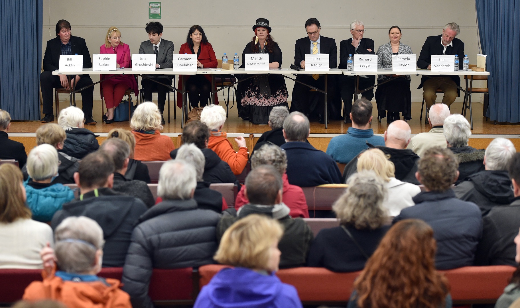 Mayoral candidates front up to voters at Burns Hall last night. Photo: Gregor Richardson