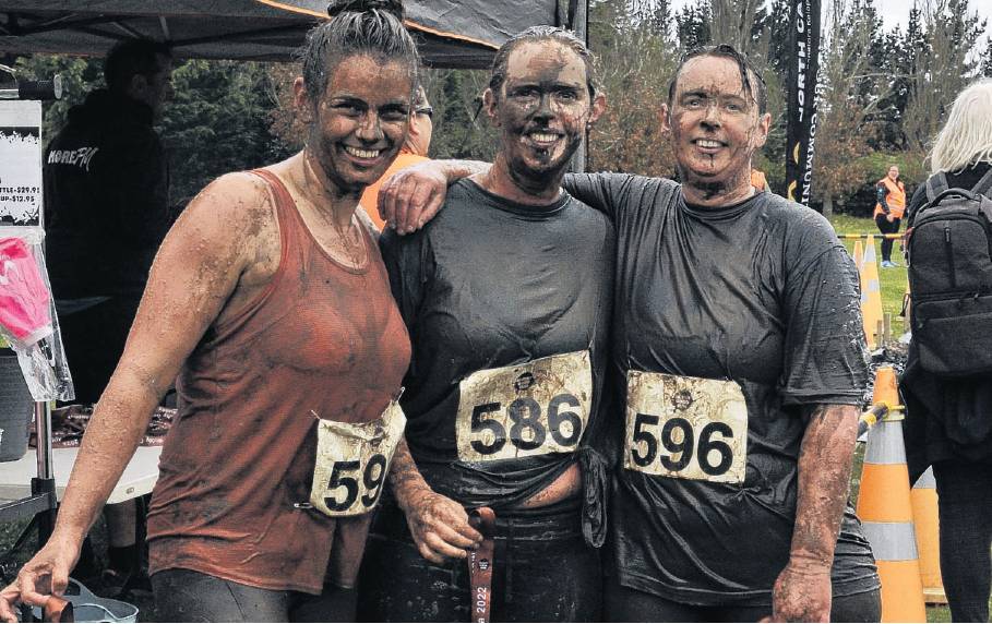 Slipping and sliding, having muddy good fun | Otago Daily Times Online News