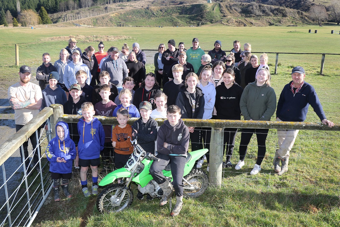 Lawrence Gymkhana Club spokesman Paul Wilson stands at the right of a group demonstrating the...
