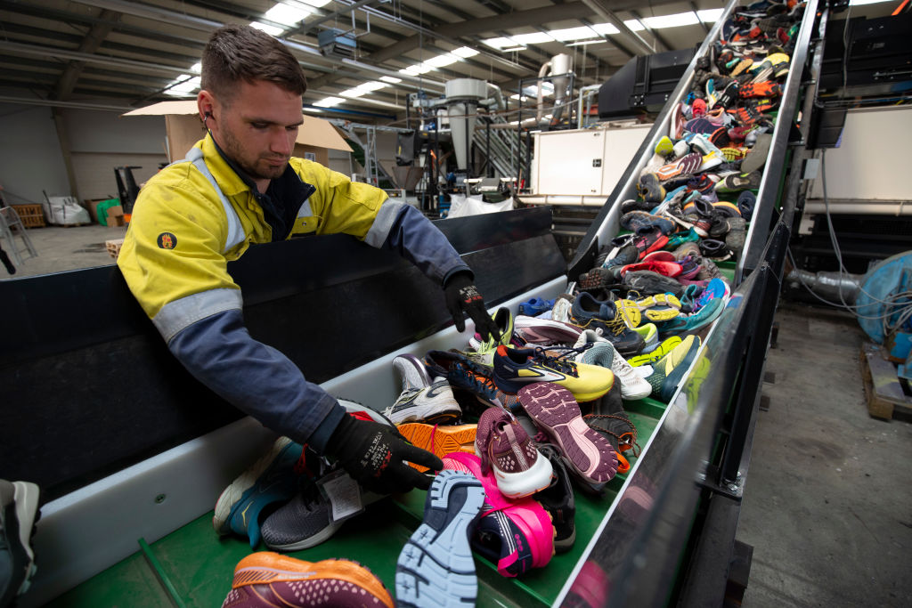 Shoes are recycled at Fast Feet Grinded, the world's first shoe recycling factory processing...
