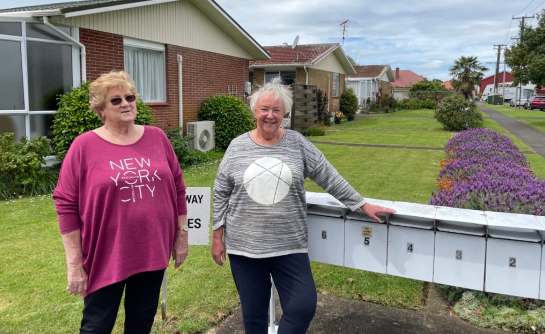 Lorraine Moon (left) and Pauline Sheddan have bought flats in Sandringham as part of Auckland...