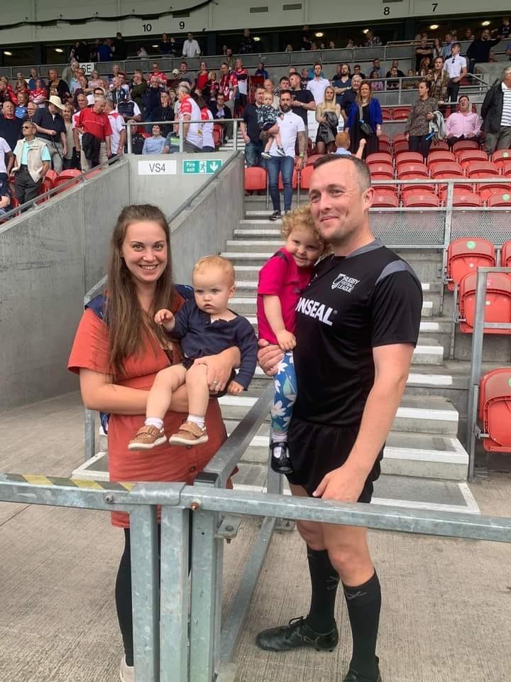 Smaill after his Super League debut with wife Sarah and children Elsie and Teddy. Photo: Supplied