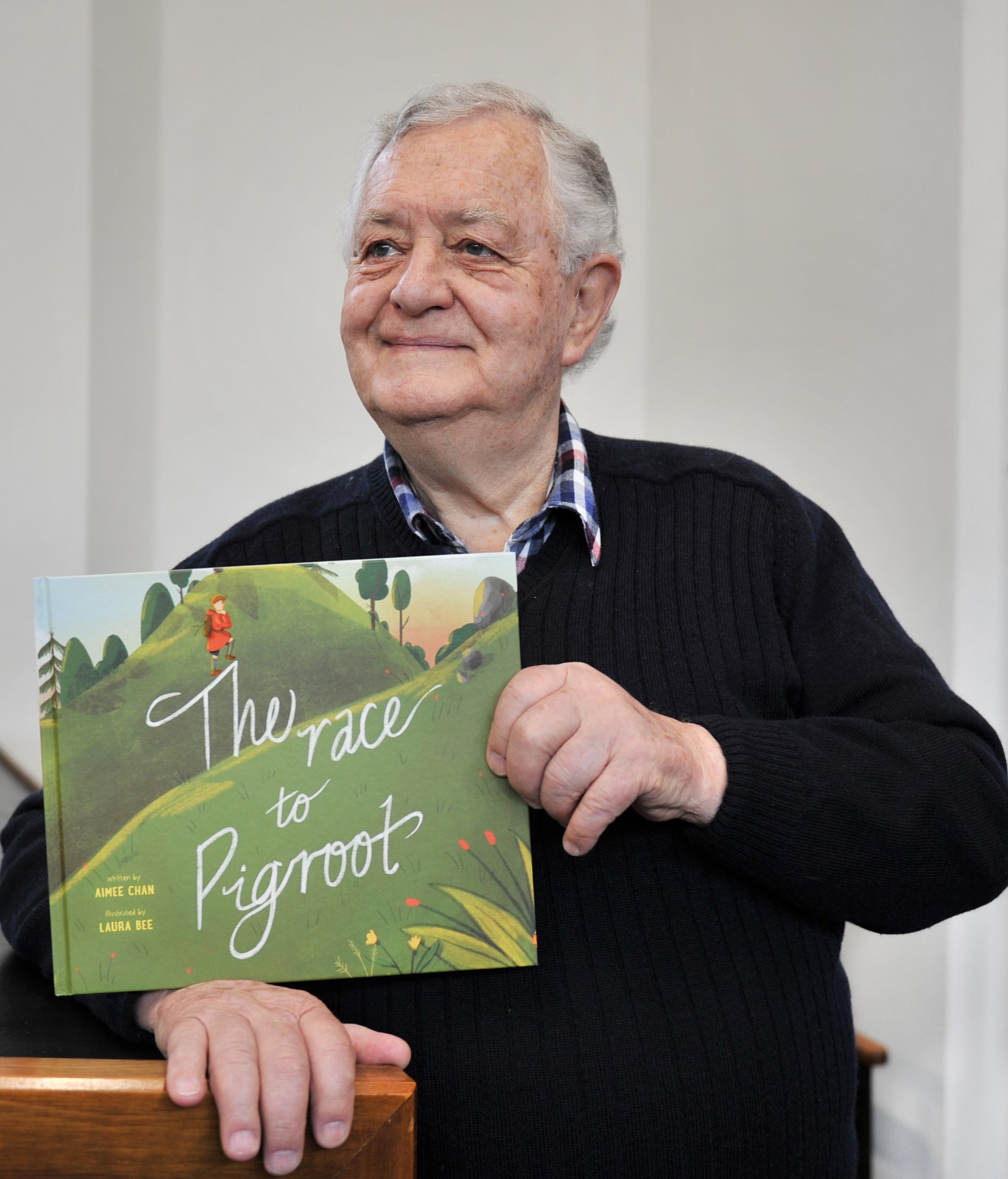 Victor Gray with a new children’s book inspired by his adventure more than 60 years ago. Photo:...