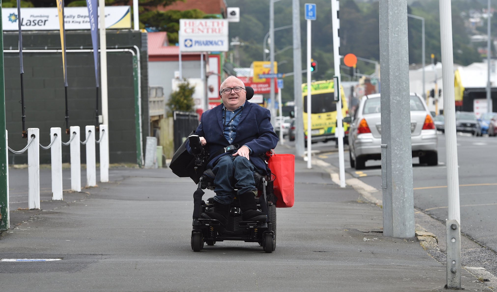 Disabled persons advocate Chris Ford says people with disabilities are waiting hours for a taxi....