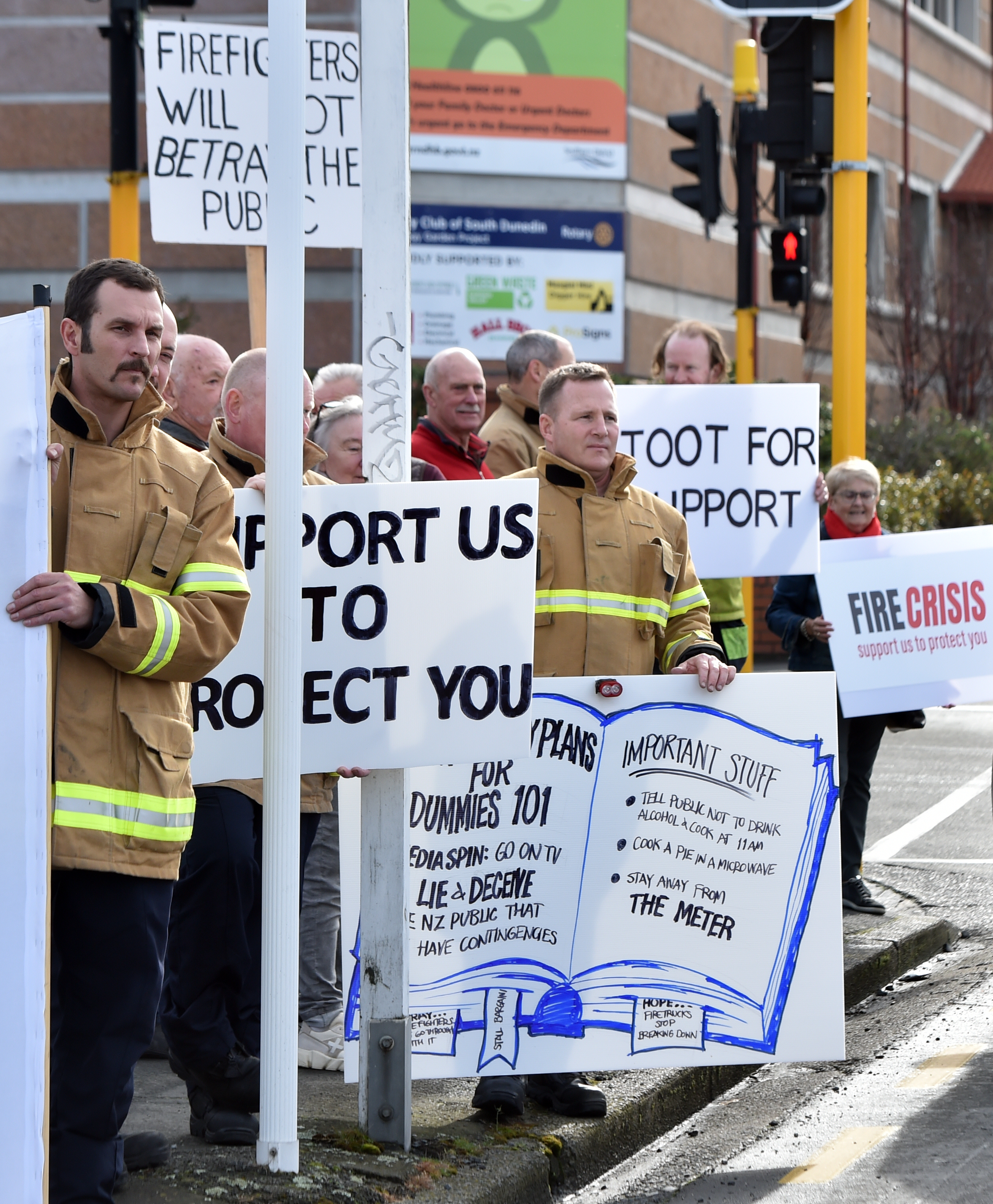 Protesting firefighters in Cumberland St during their one-hour strike today. PHOTO: PETER MCINTOSH
