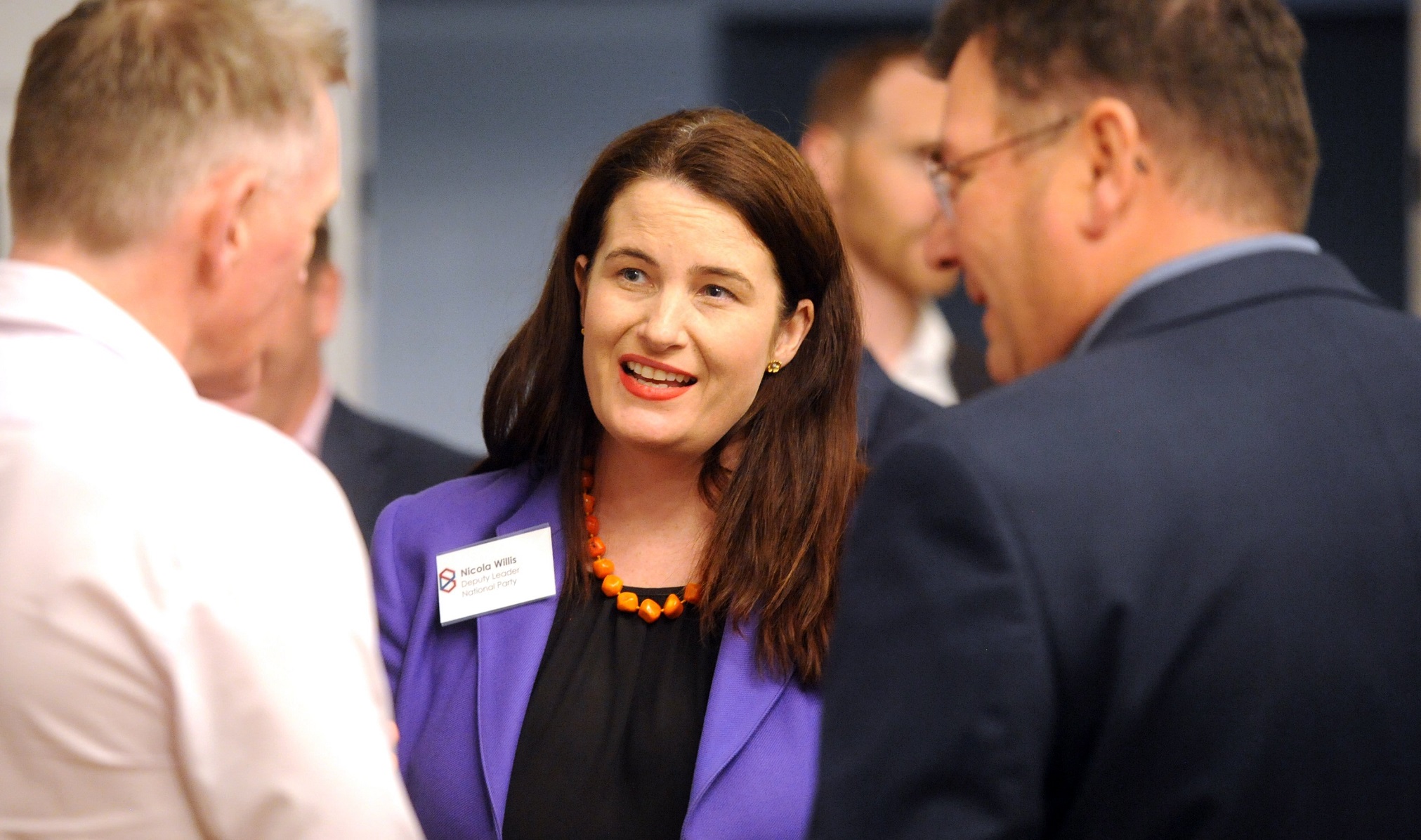 Nicola Willis talks with Selwyn Smith (left) and city councillor Andrew Whiley at a Business...