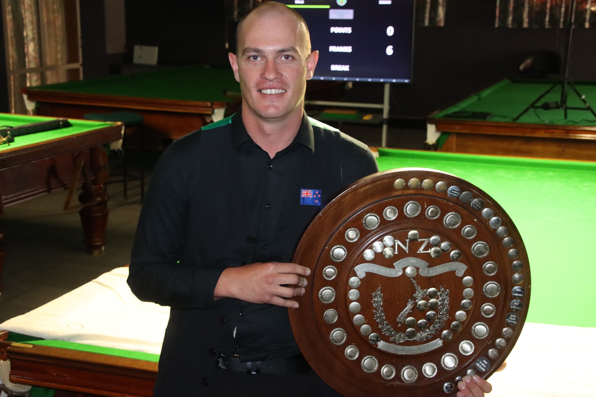 Gore’s Shannon Swain holds the trophy for winning the New Zealand Billiards and Snooker...