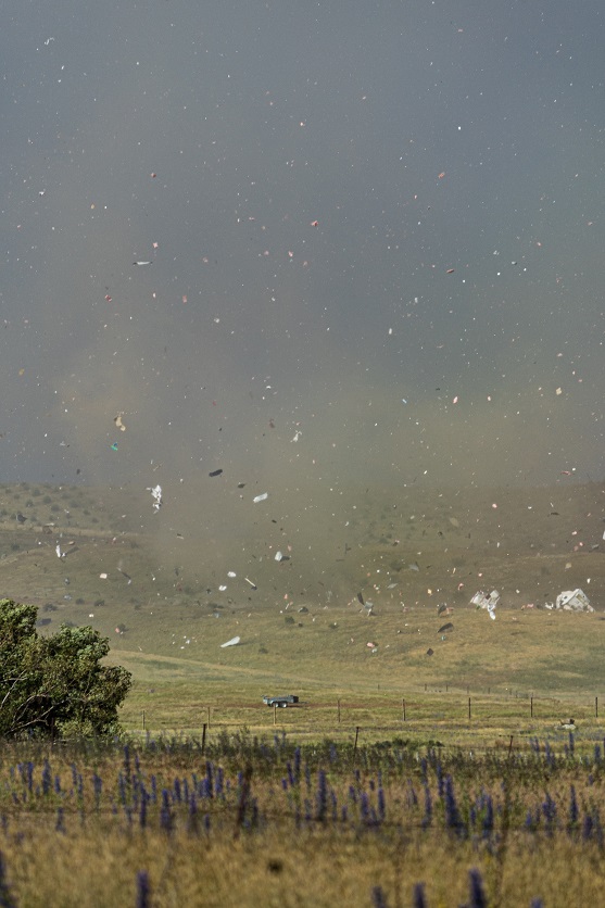 Debris goes flying after a tornado struck properties at Springvale near Alexandra. Photo: Connor...