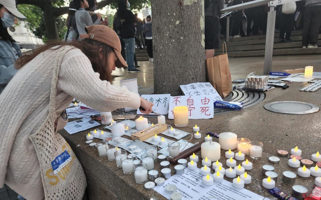 Some at the gathering chose a softer way of showing solidarity with the victims of the Urumqi...