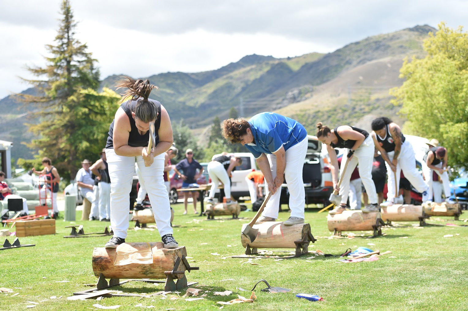 Axewomen compete in the underhand competition.
