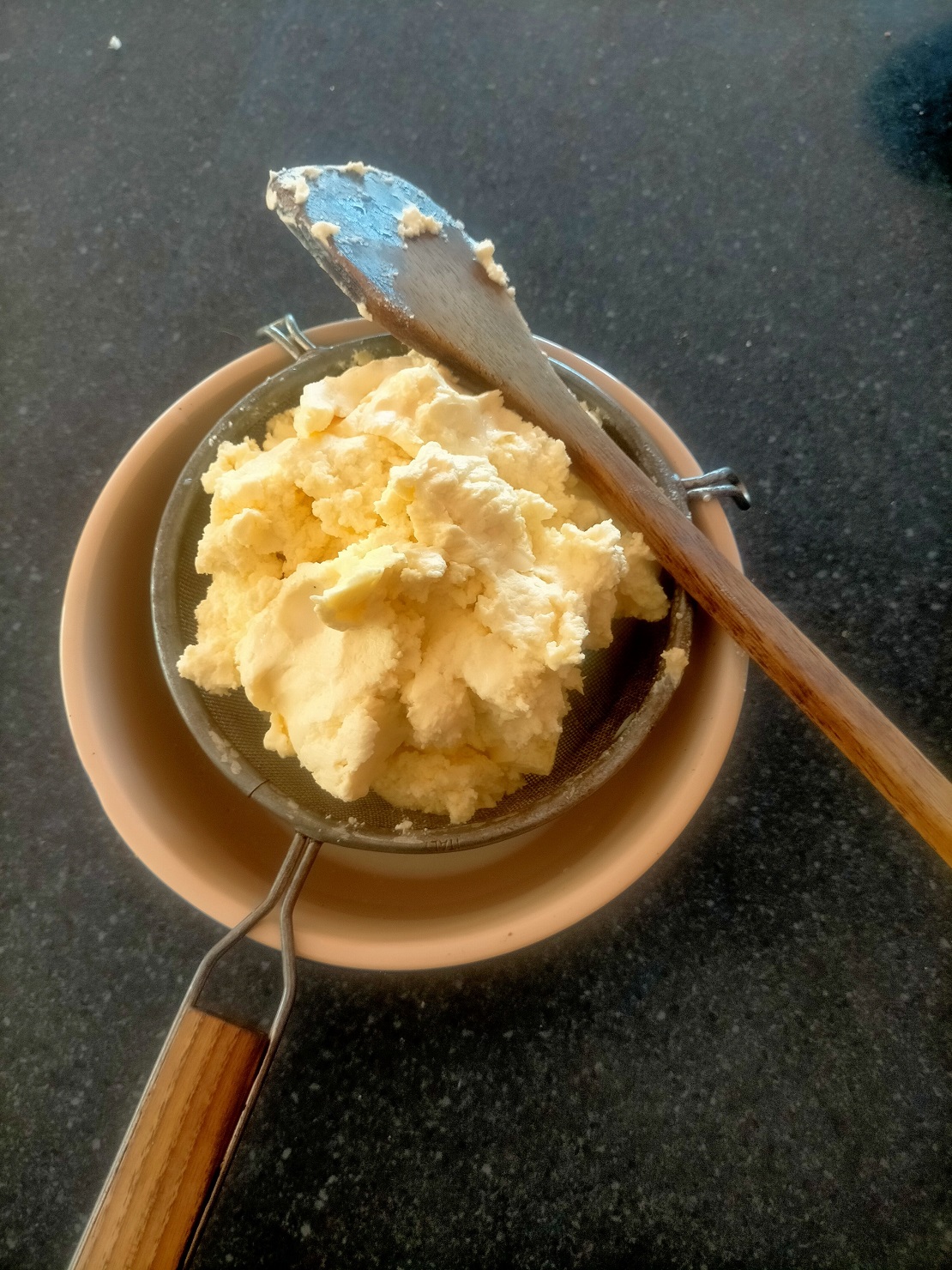 Line a colander or sieve with a clean piece of butter muslin, place the sieve over a bowl to...