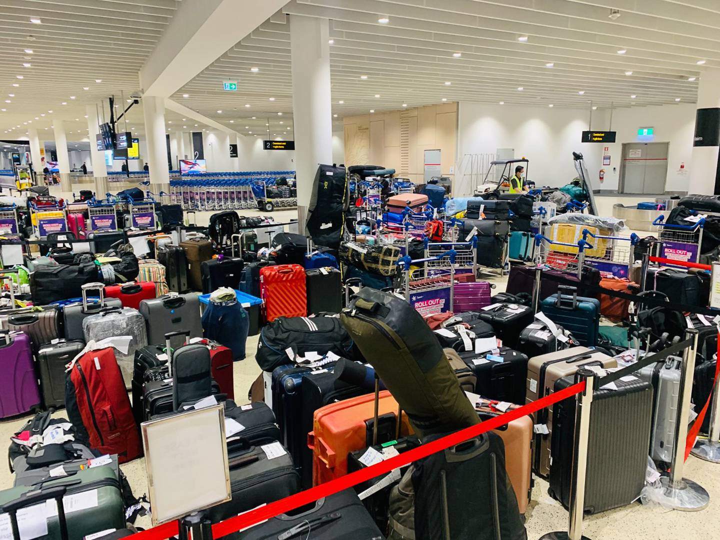 Baggage stacked up at Auckland Airport on Christmas Day. Photo: Ant Clausen