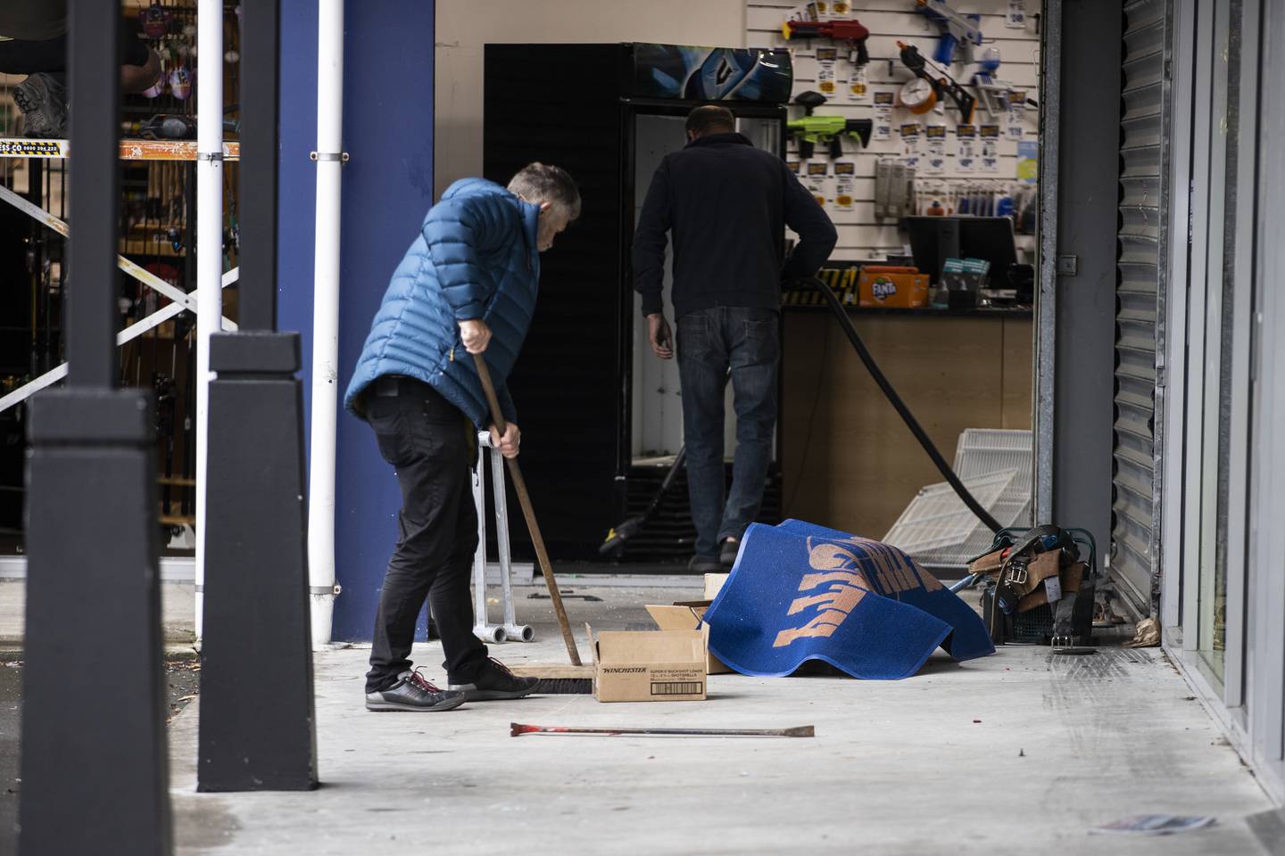Following the incident, staff and contractors arrived at the shop to sweep up debris and repair...