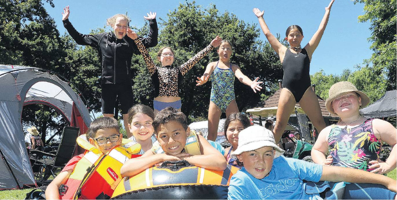 Family fun . . . Enjoying their stay camping at the Ashley Gorge Holiday Park were (from front...