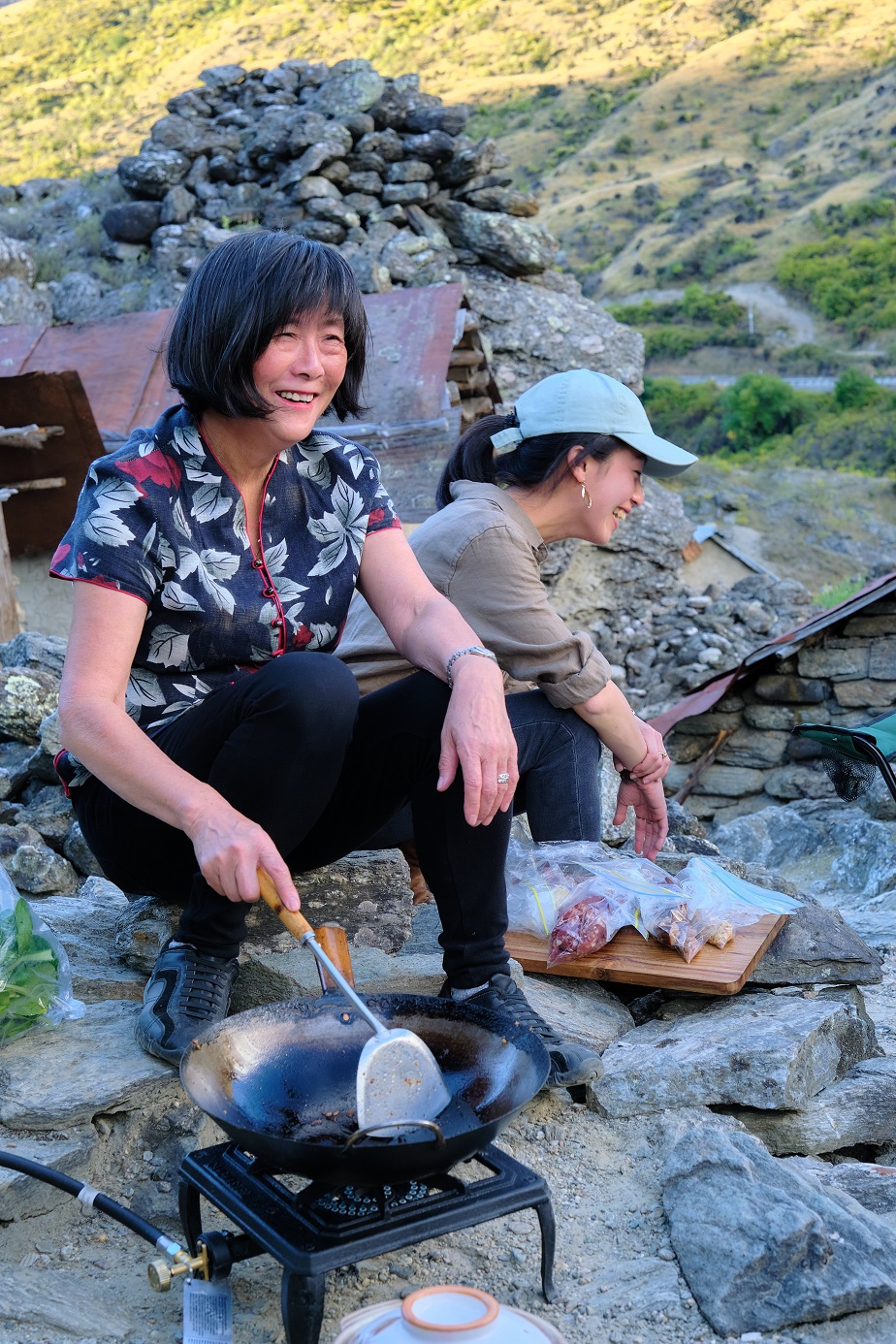 Jean Lai attempts to cook in the Central Otago Chinese miners village.