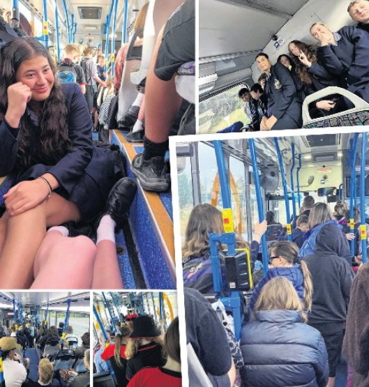 School pupils and adult commuters are packed in, with many standing in the aisle, during long...