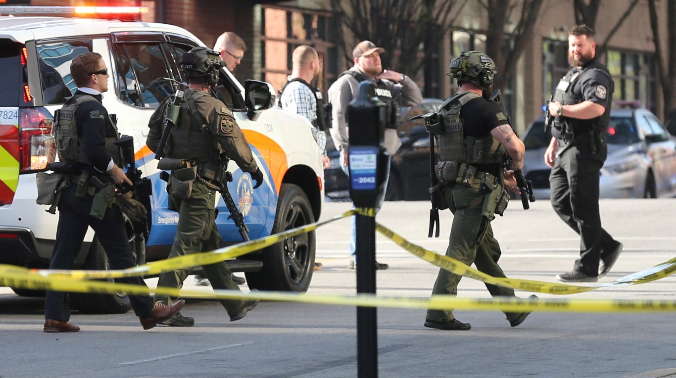 Police deploy at the scene of the shooting in downtown Louisville, Kentucky. Photo: Michael...