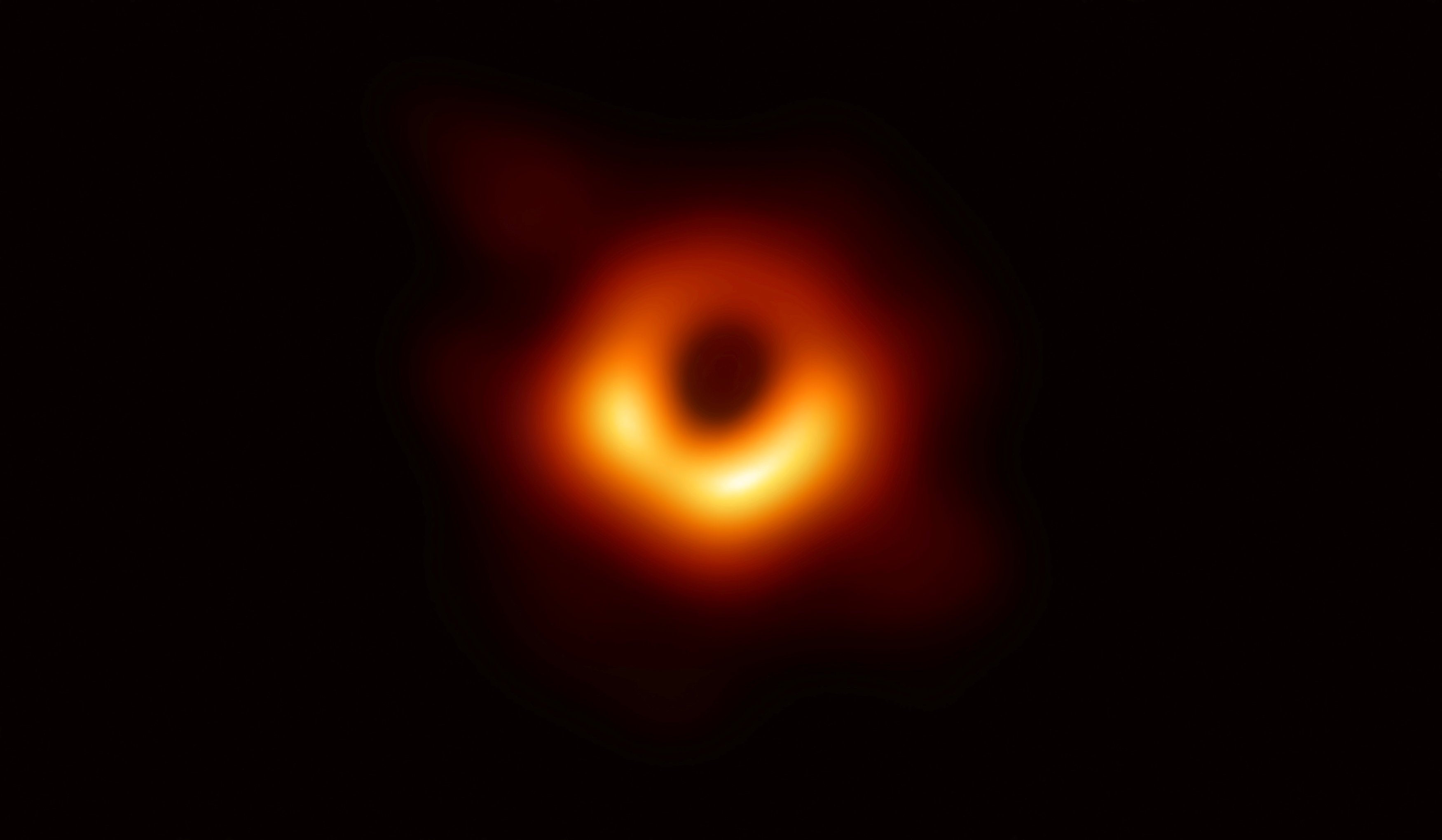 The first photo of a black hole, taken using a global network of telescopes, conducted by the...