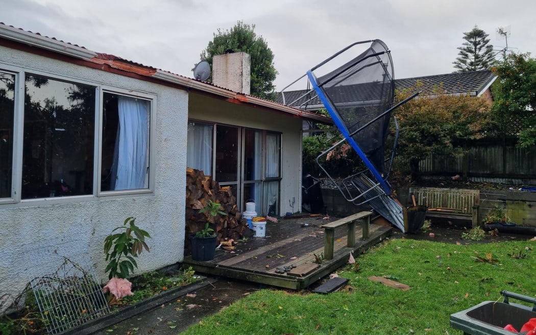 A trampoline upended and tossed into a house by the severe wind on Tuesday morning. Photo: RNZ 