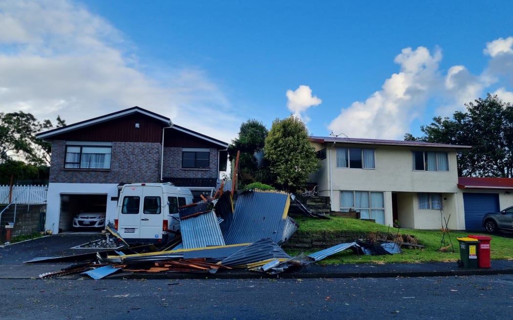 Debris piled outside a house on Aorangi Road, Paraparaumu, after a tornado on Tuesday morning....