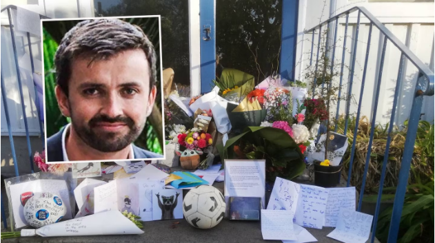 Tributes for Isaac Levings were placed outside his classroom at Elmwood Normal School.