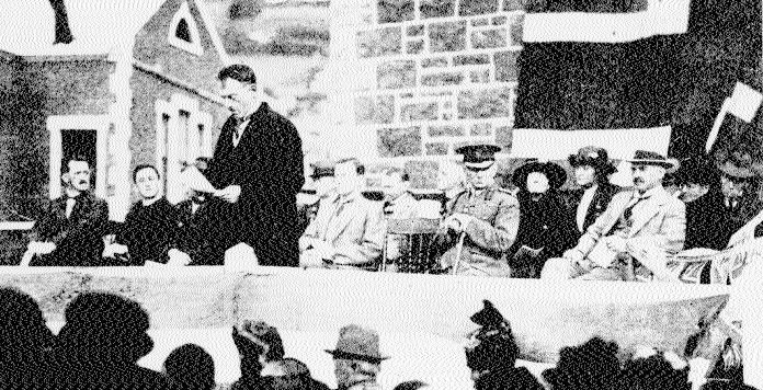 A news report on the dedication of the memorial arch on Anzac Day, 1921, in a ceremony led by...