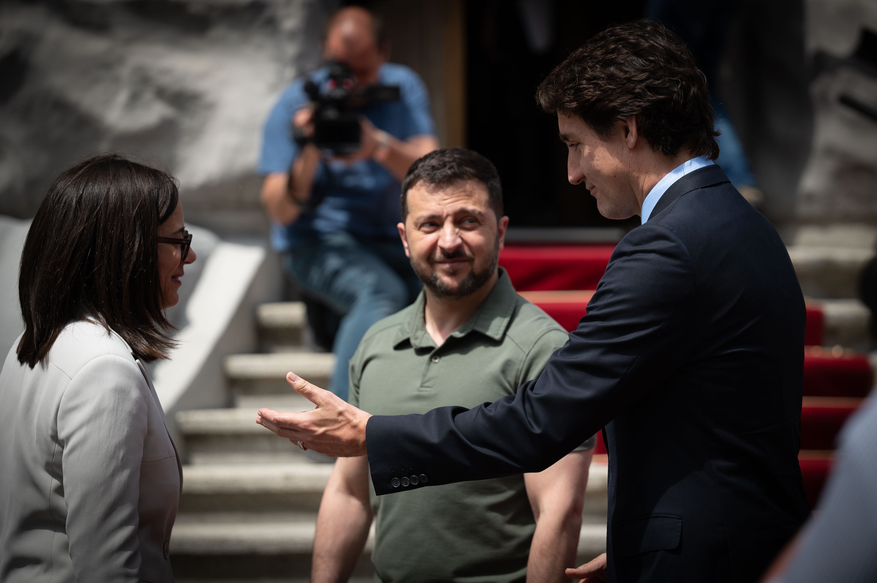 Canadian Prime Minister Justin Trudeau and Ukrainian President Volodymyr Zelenskiy chat before...