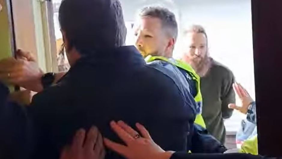 In a video, police are forced to break up a large scuffle between Stop Co-Governance protesters...