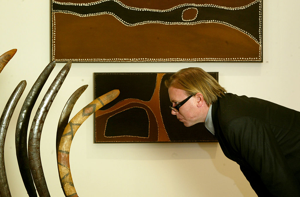 Tim Klingender examines a collection of boomerangs from Queensland ahead of a Sotheby's...
