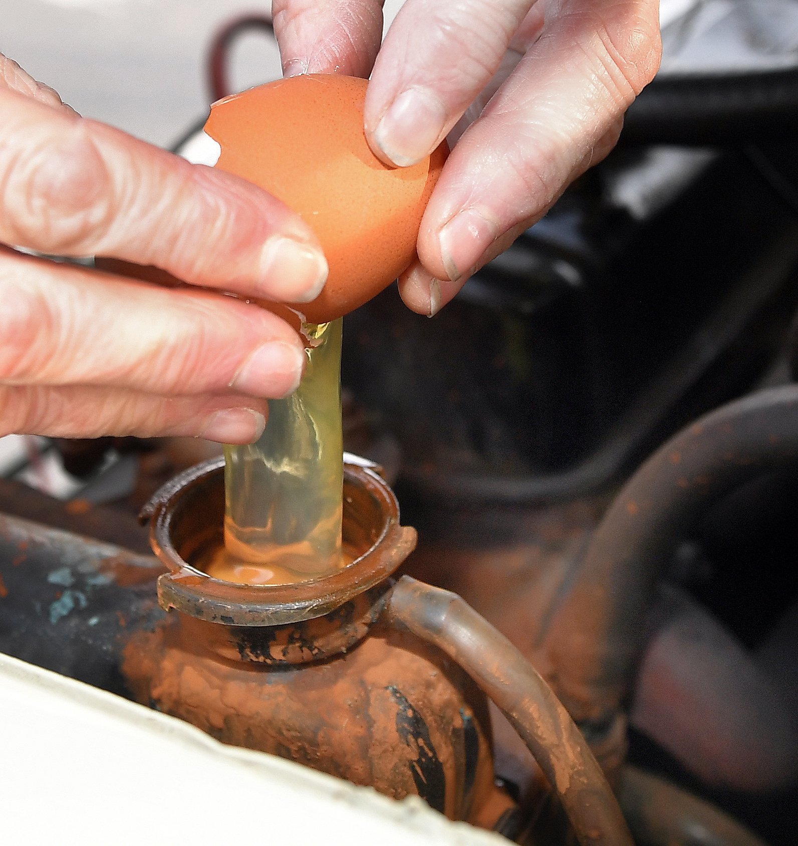 A raw egg, yoke and all, poured into ODAILY’s radiator.