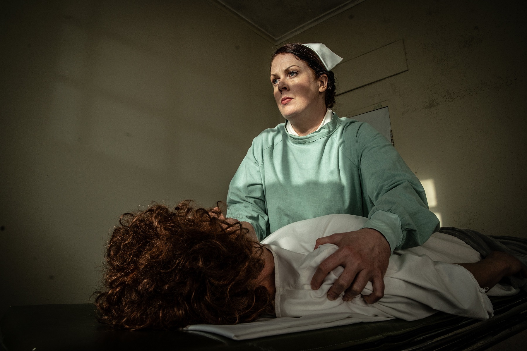 Anna Leese as fictional nurse Katherine Baillie and Jayne Tankersley as Janet Frame in The...