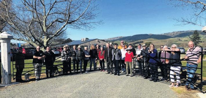 Paul Williams, with Hurunui Mayor Marie Black (centre), with local residents at the official...