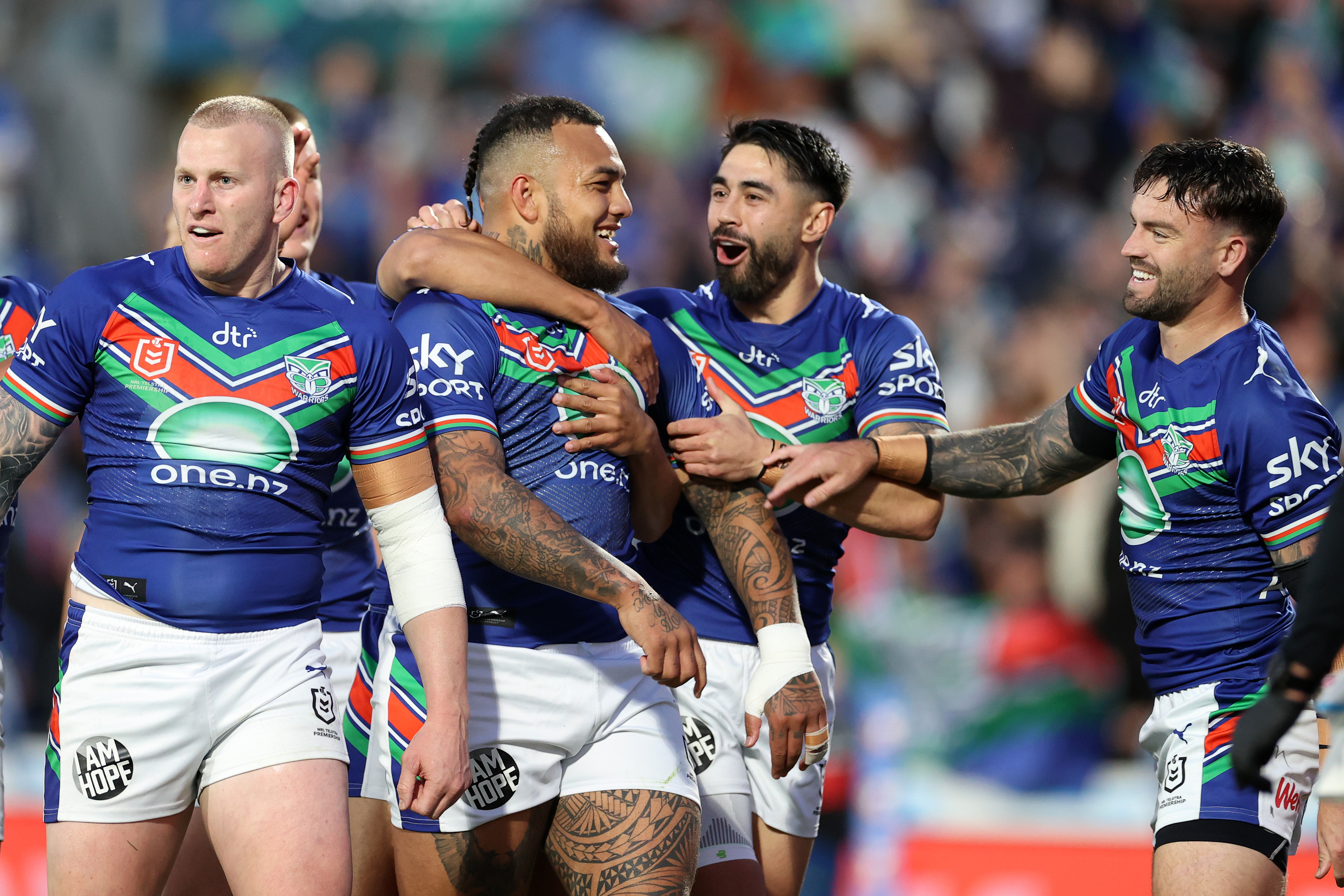 Warriors players celebrate after Addin Fonua-Blake scores a try during the NRL semifinal.  Photo...