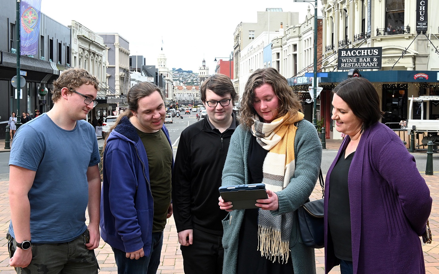 Ōtepoti Dunedin Heritage Festival co-ordinator Alison Breese (right) discusses the app she...