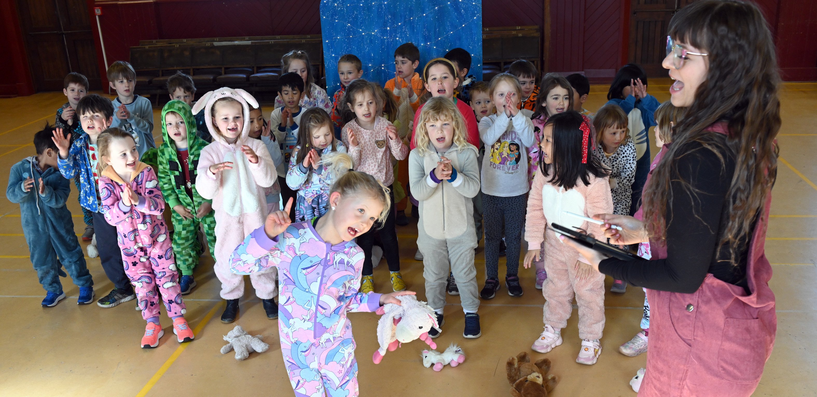 Maori Hill School pupil Riley Cutler, 6, and her classmates are conducted by the professional...