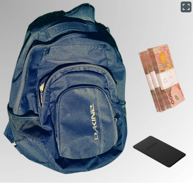 Some paper money and a GPS tracker were hidden inside this backpack ahead of the fake money drop....
