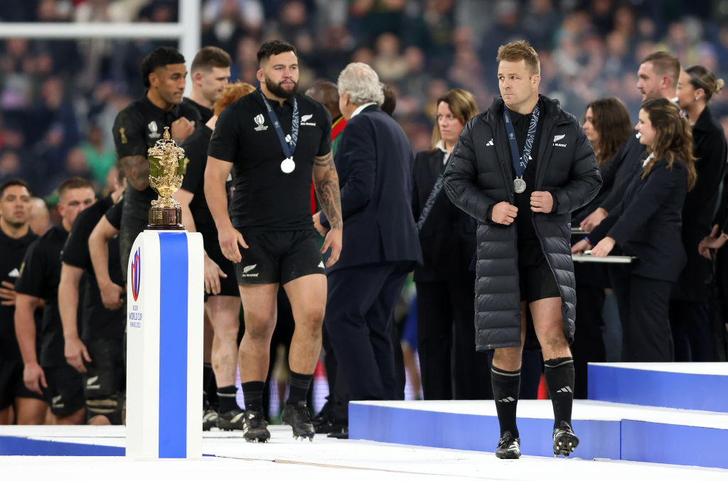 All Blacks captain Sam Cane leads the team as they receive their silver medals. Photo: Getty Images 