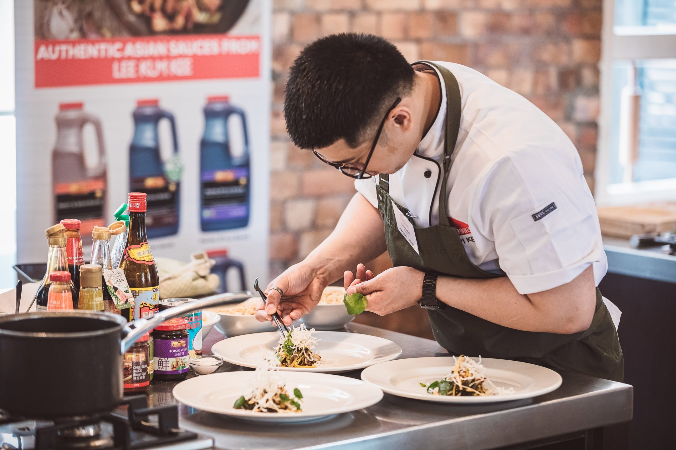 Quiel Mallari works on his dish at the finals of the Lee Kum Kee New Zealand Developing Chefs...