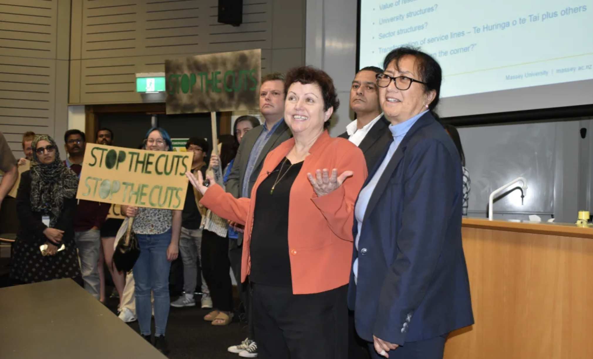 Staff and student protesters entered a meeting at Massey University's campus to demonstrate...