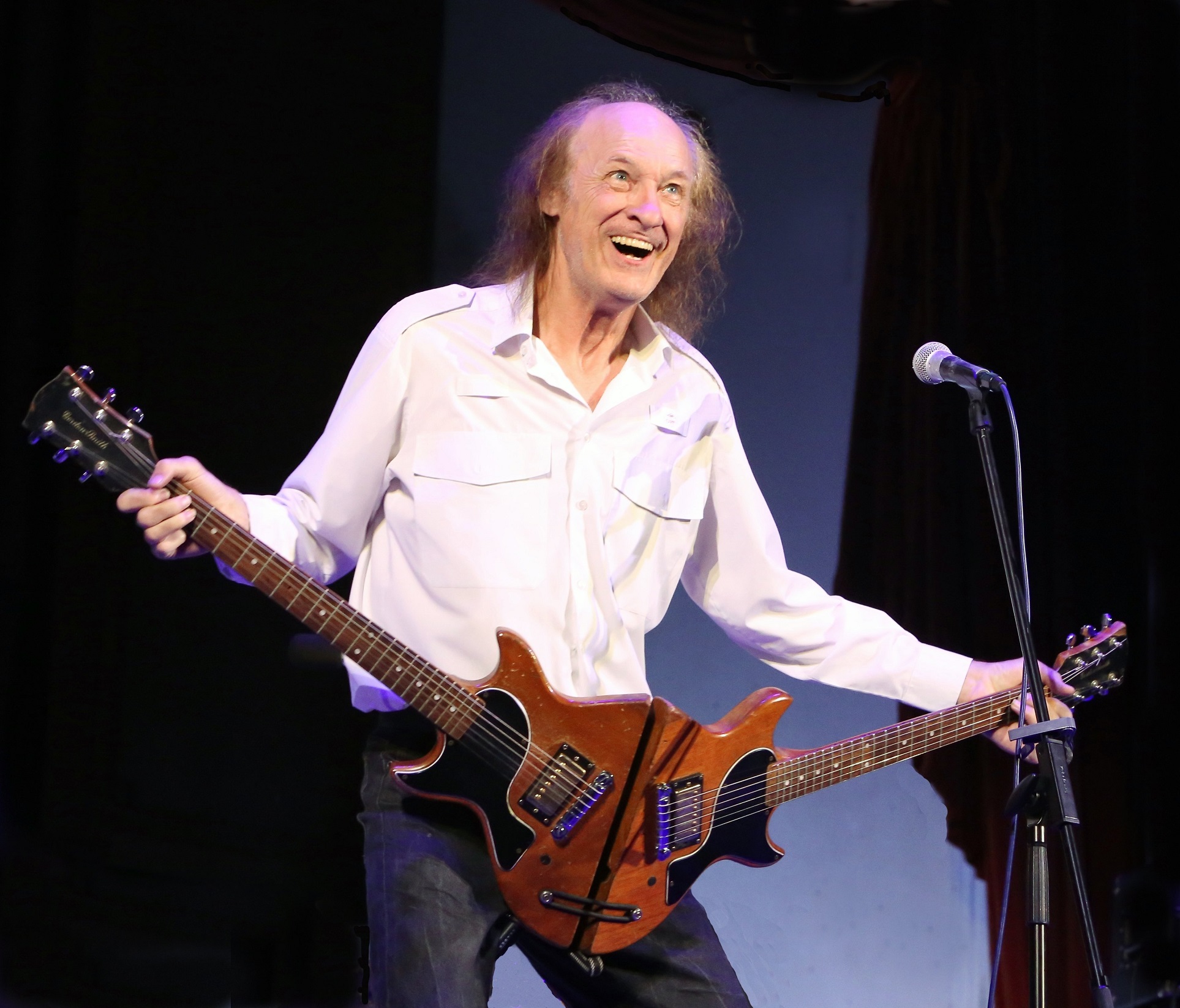John Otway on stage with his trick guitar. Photo: supplied
