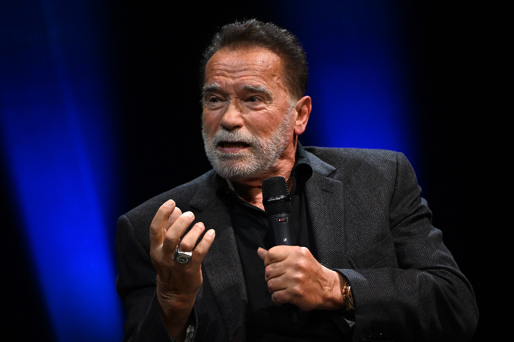 Arnold Schwarzenegger speaks onstage at an Evening with Arnold Schwarzenegger at London Palladium...
