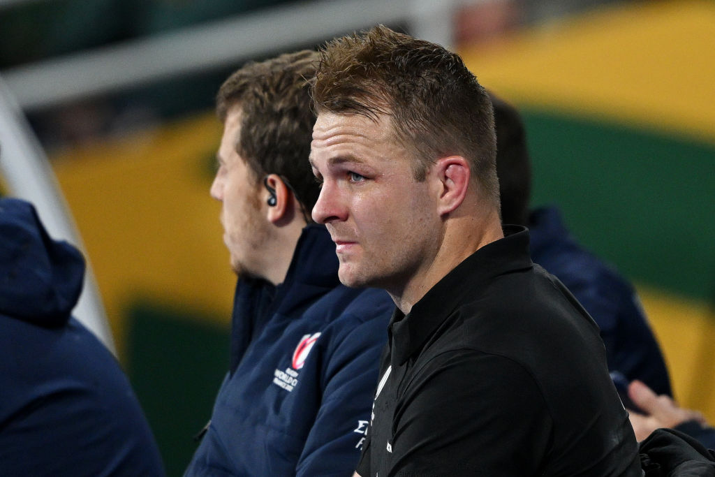 Sam Cane sits on the sideline at the Rugby World Cup final after getting a red card. Photo: Getty...
