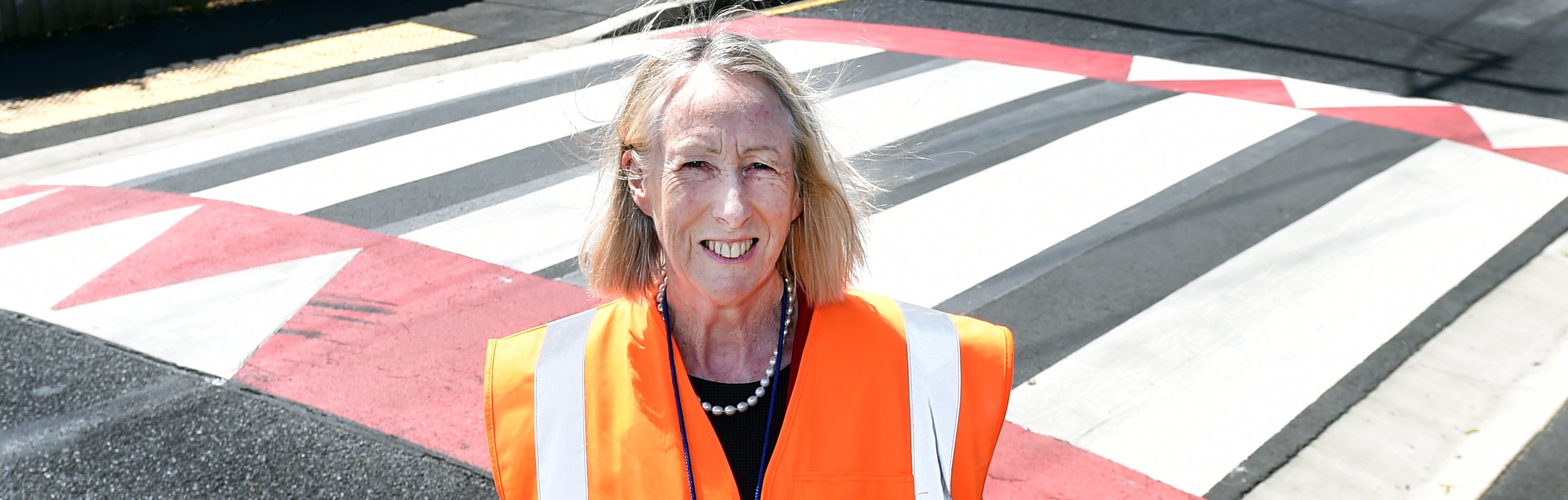 Andersons Bay School principal Pauline Simpson runs the road patrol outside the school yesterday....