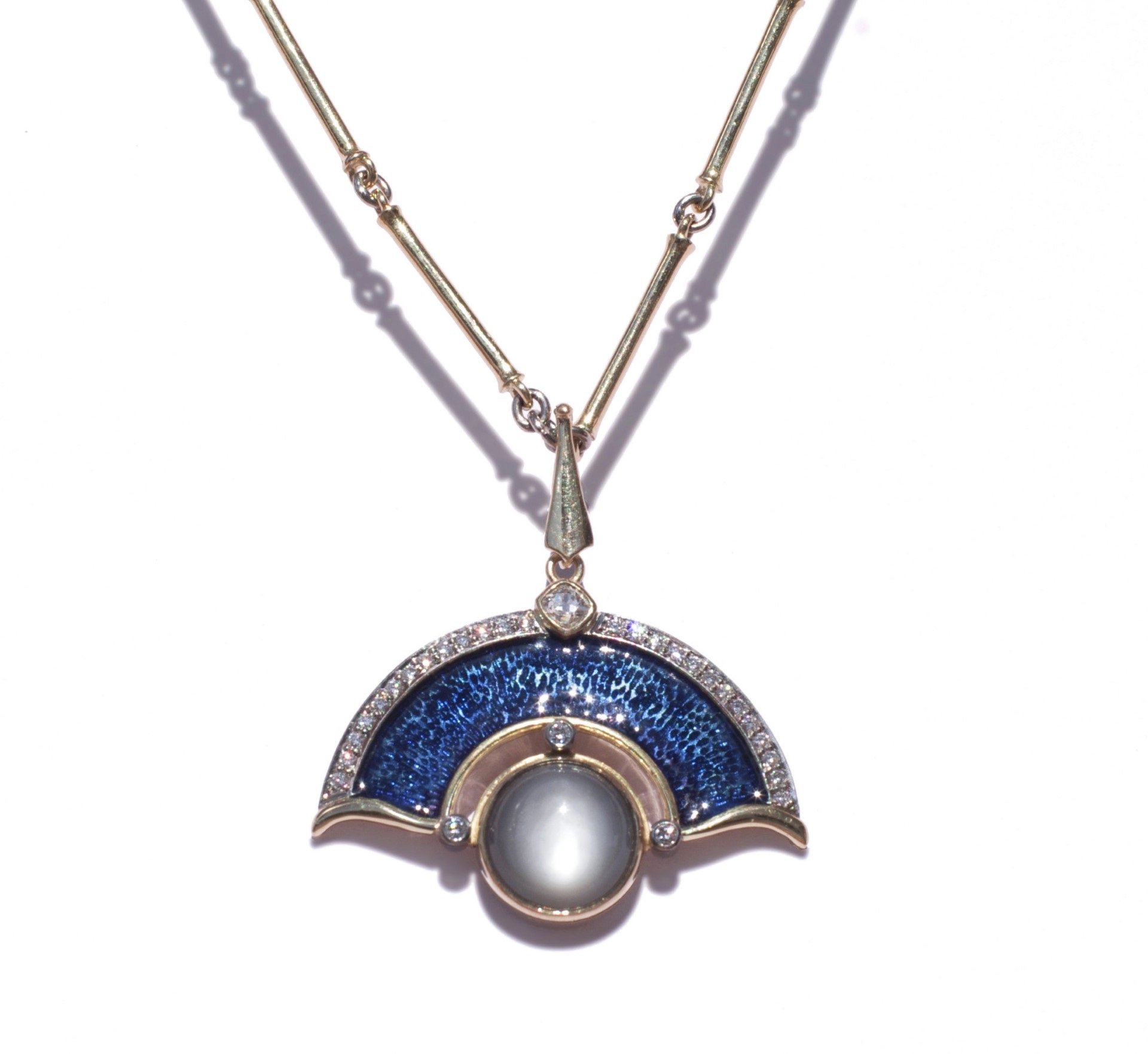 The "Midnight" Moonstone pendant is a featured work in an exhibition of jewellery by Dunedin...