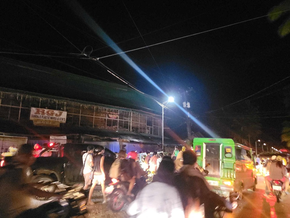 People evacuate buildings in Hinatuan, Surigao del Sur, Philippines following the earthquake....