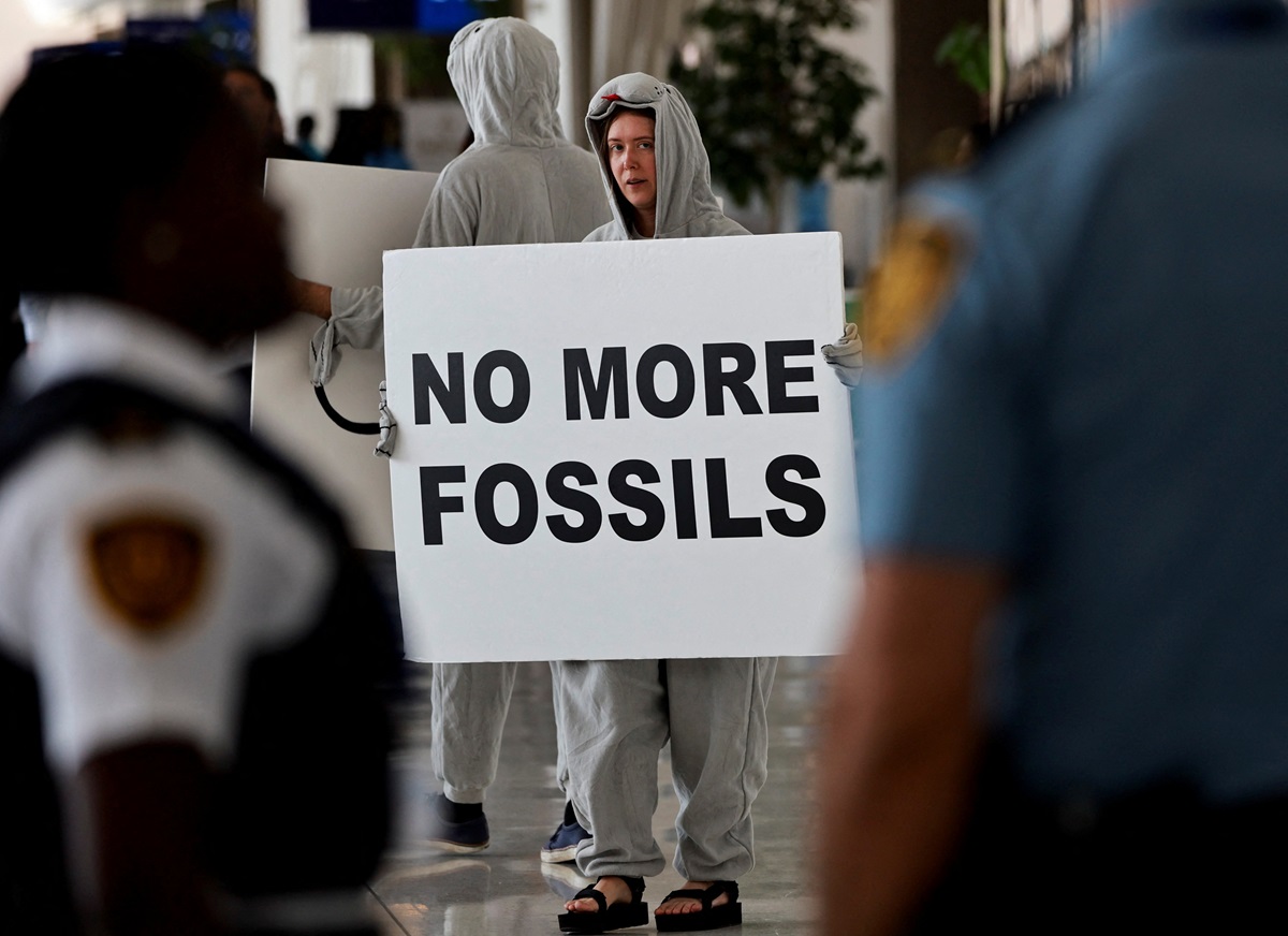 An activist protests at the United Nations Climate Change Conference COP28 in Dubai. Photo: Reuters