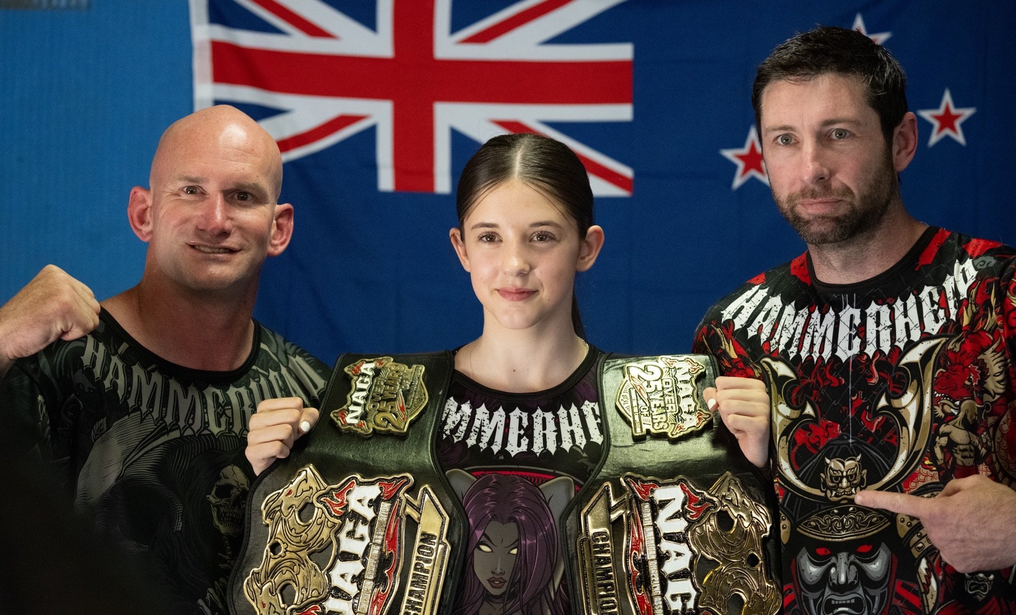Shyla poses with coach Jason Senna Magnago Smith (left) and father Marcus Mulholland.