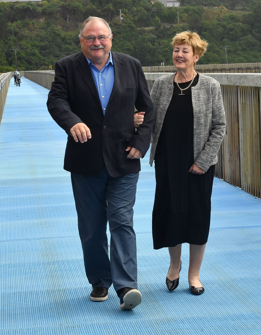 Dunedin surgeon Dick Bunton walks with wife Lynley, after he was awarded an ONZM for services to...