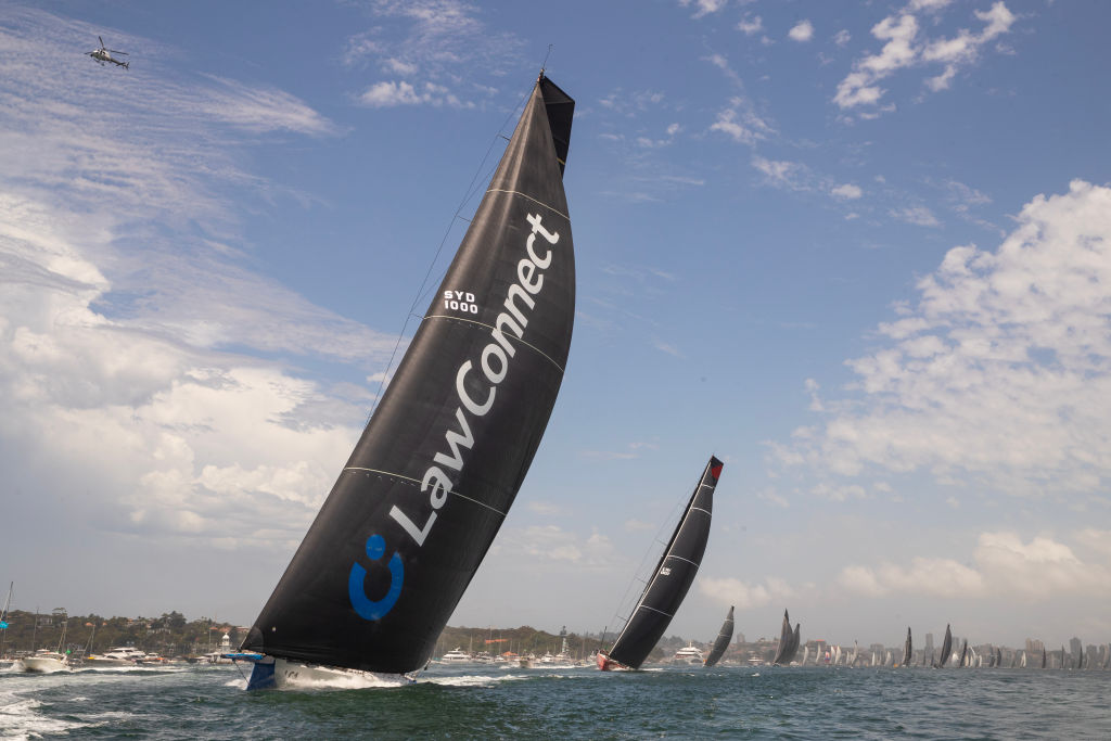 LawConnect heads up Sydney Harbour at the start of the 2023 Sydney to Hobart race. Photo: Getty Images